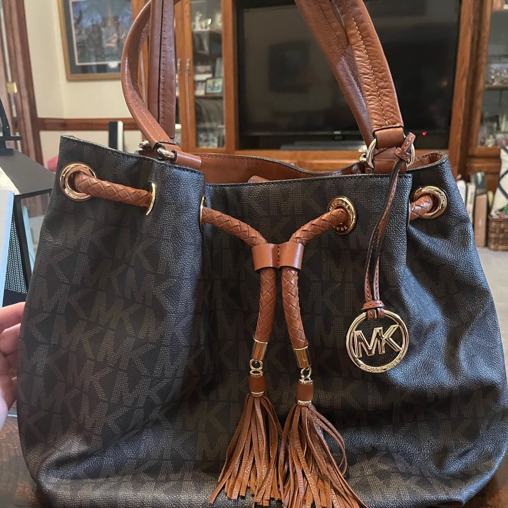 Excellent used condition Michael Kors purse with tassels